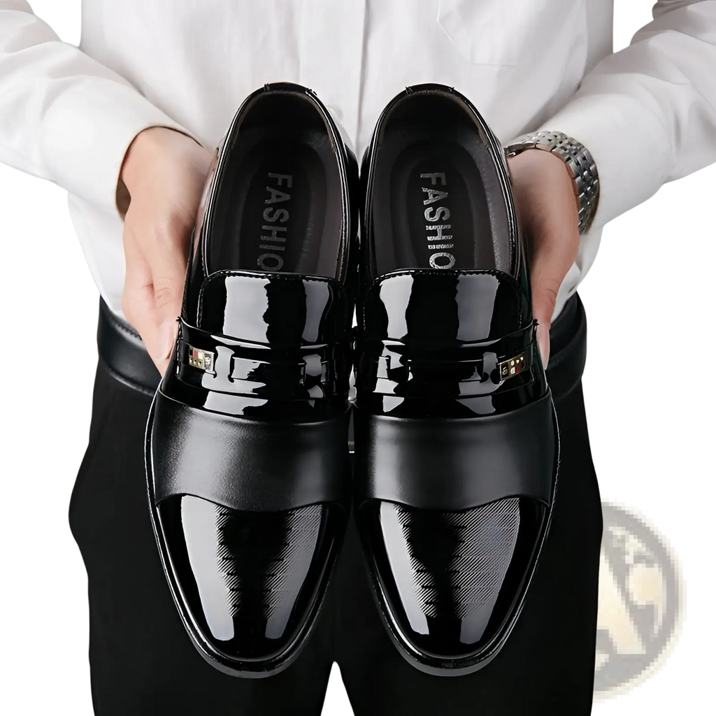 Men’s patent leather buckle loafers in black with a glossy finish and gold-tone accents for business and formal wear