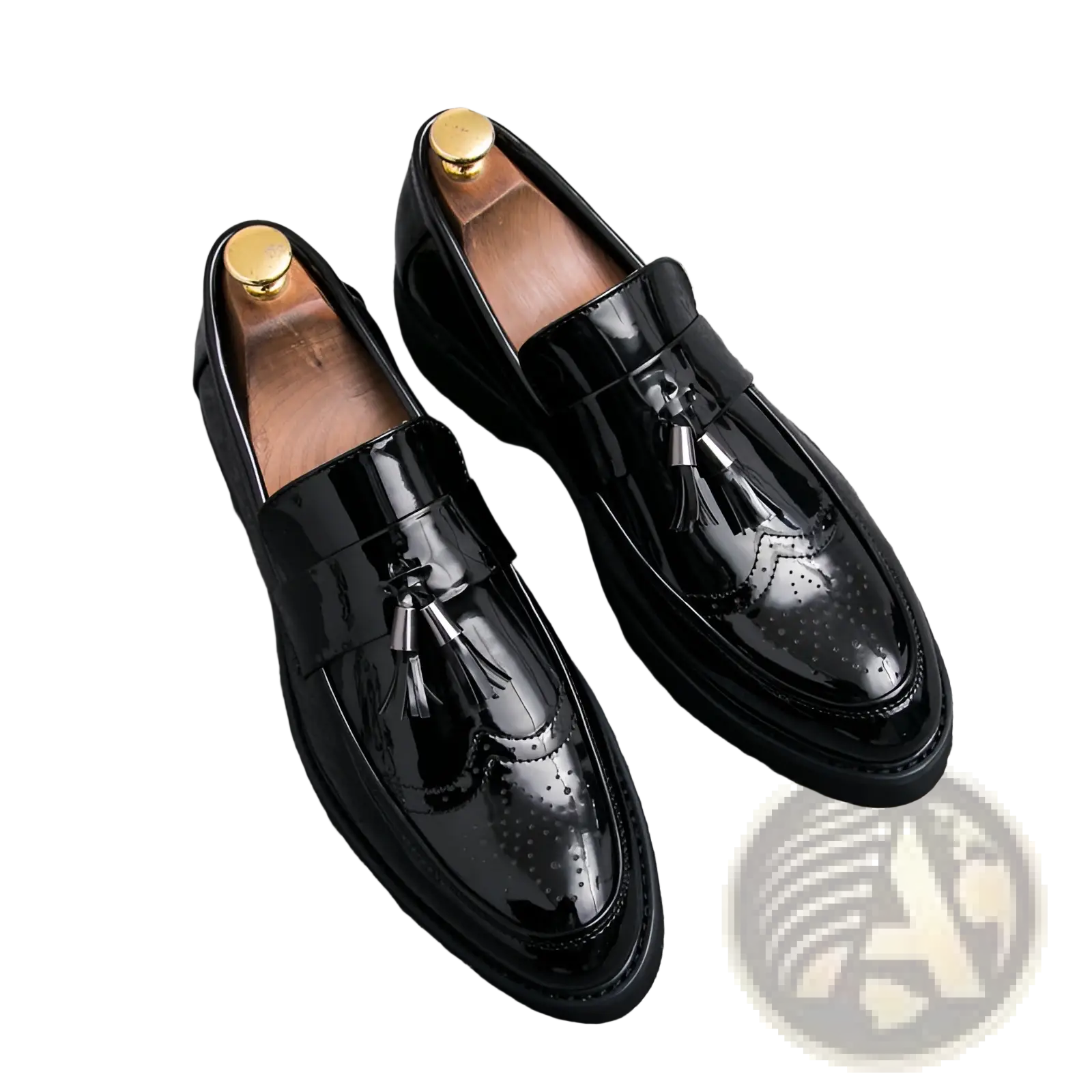 Men’s black patent leather tassel loafers with brogue detailing and gold-toned metallic strap shoe trees