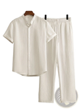 Mens pleated short sleeve shirt and pants set in white with vertical pleats and matching trousers for formal wear
