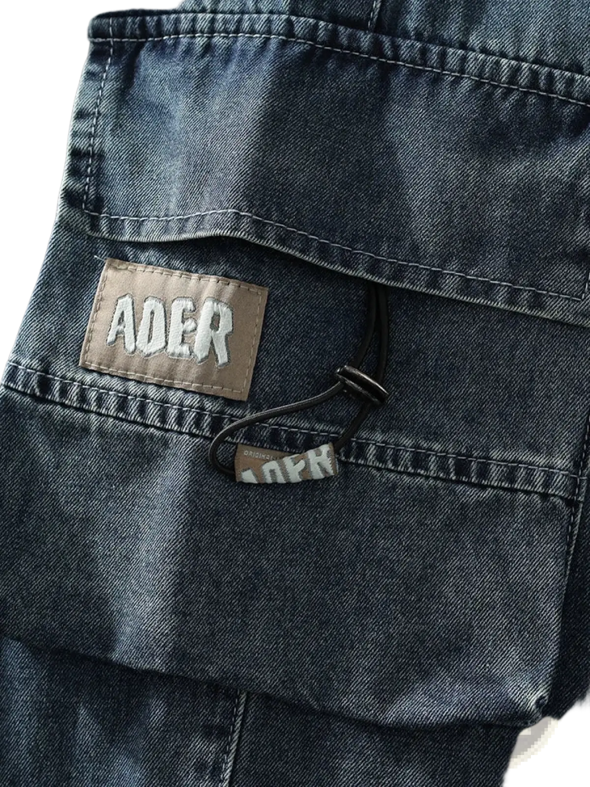 Men’s plus size baggy dark blue denim cargo pants with brown leather patch and white embroidered ader branding
