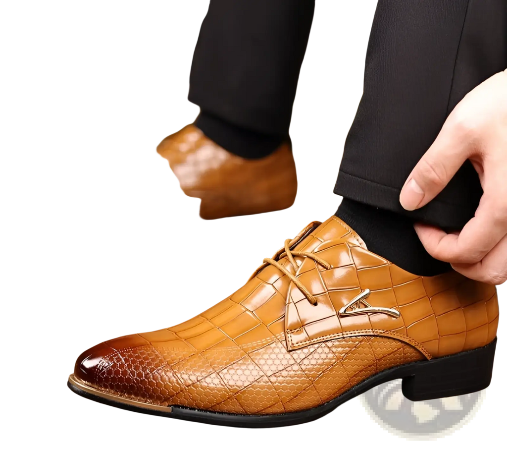 Men’s pointed toe formal leather business shoe in tan crocodile-patterned leather with glossy finish and black sole