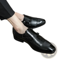 Black leather double monk strap men’s dress shoes with a polished finish and classic pointed toe design.