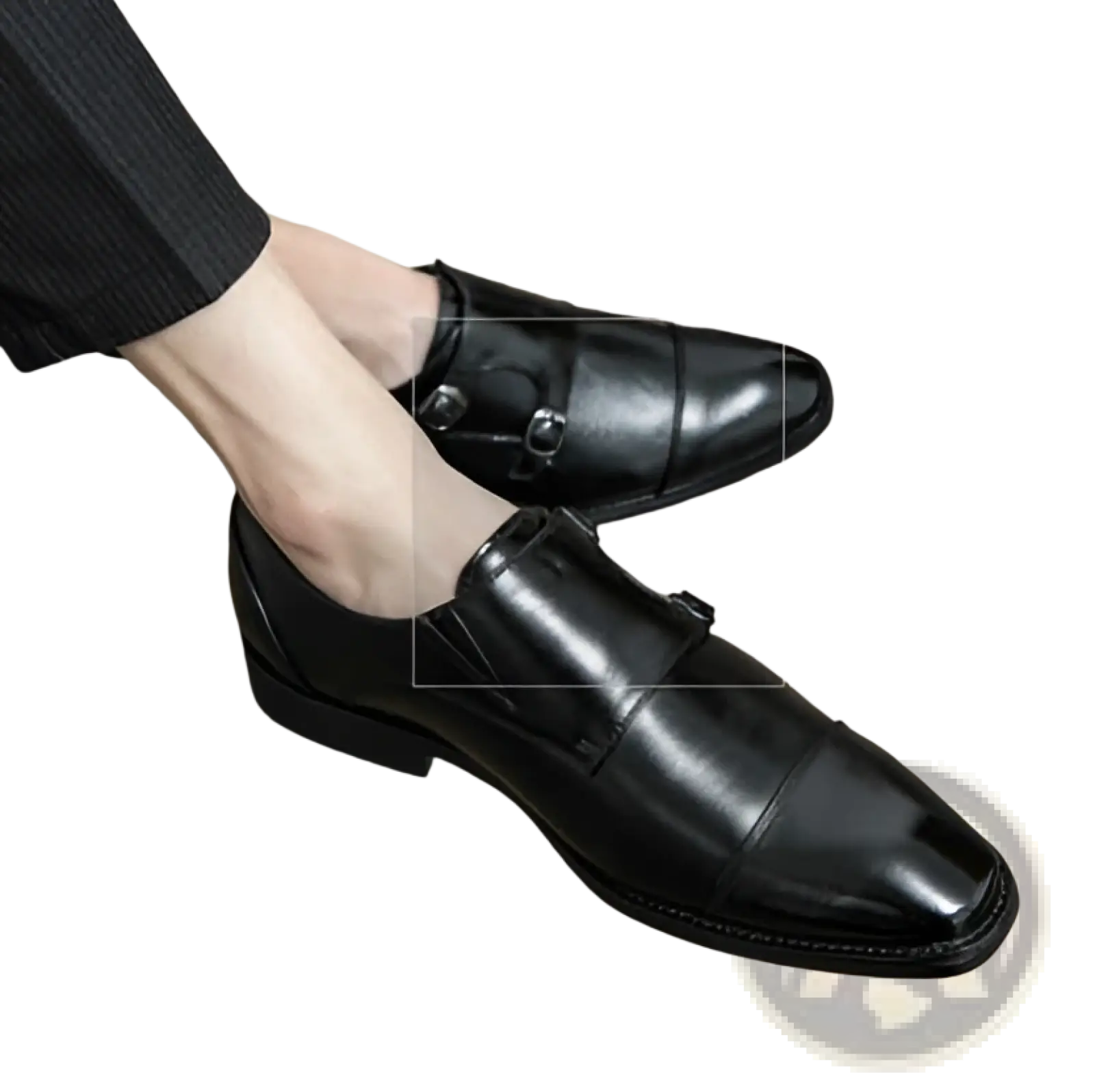 Black leather double monk strap men’s dress shoes with a polished finish and classic pointed toe design.