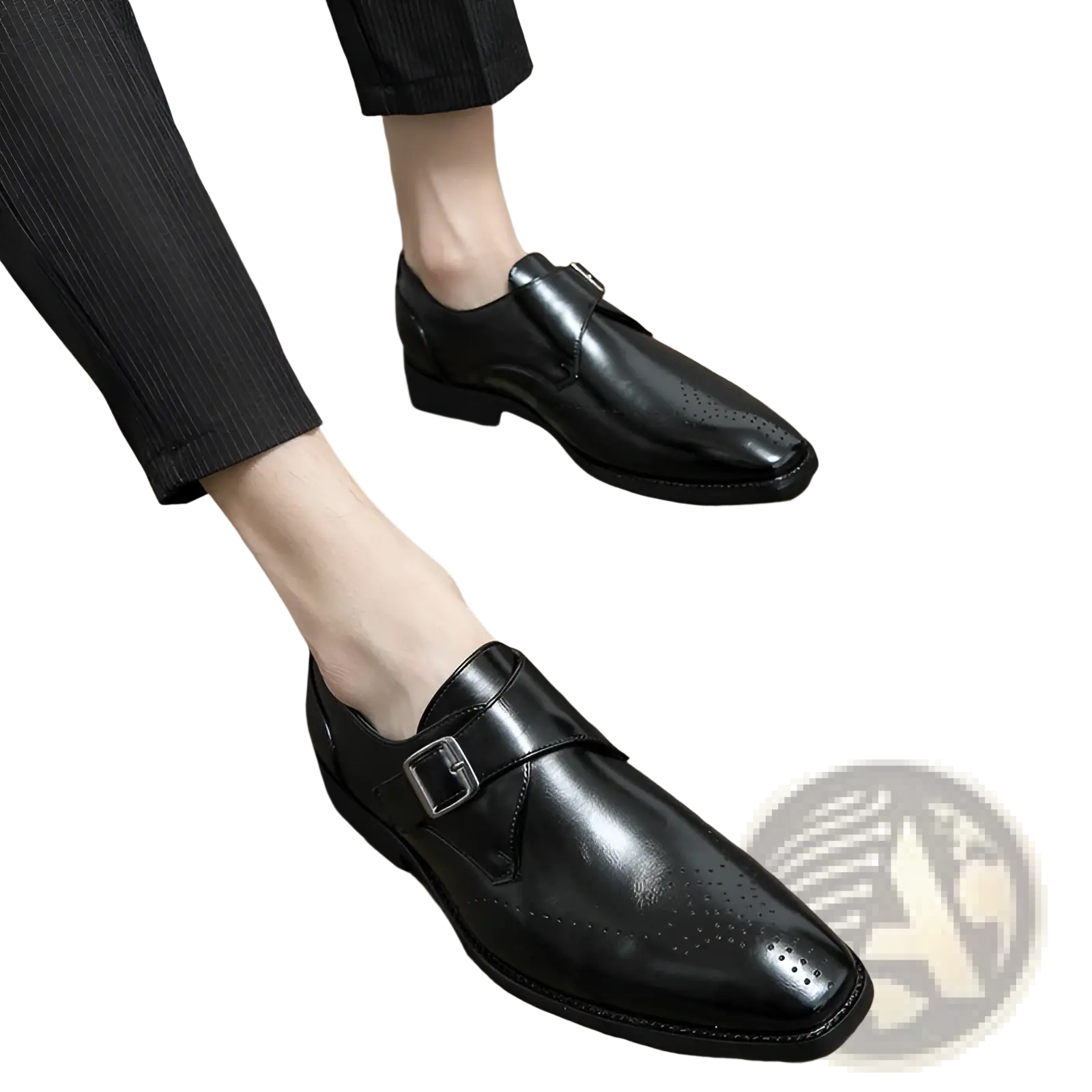 Men’s polished black leather monk strap dress shoes with subtle perforated detailing on the toe