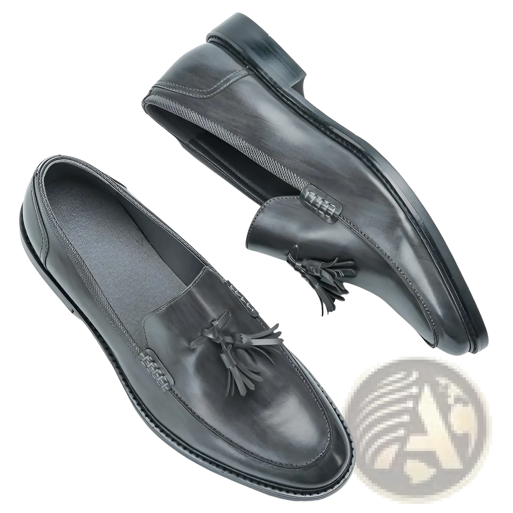 Men’s polished black leather tassel loafers with composite soles and subtle stitching details