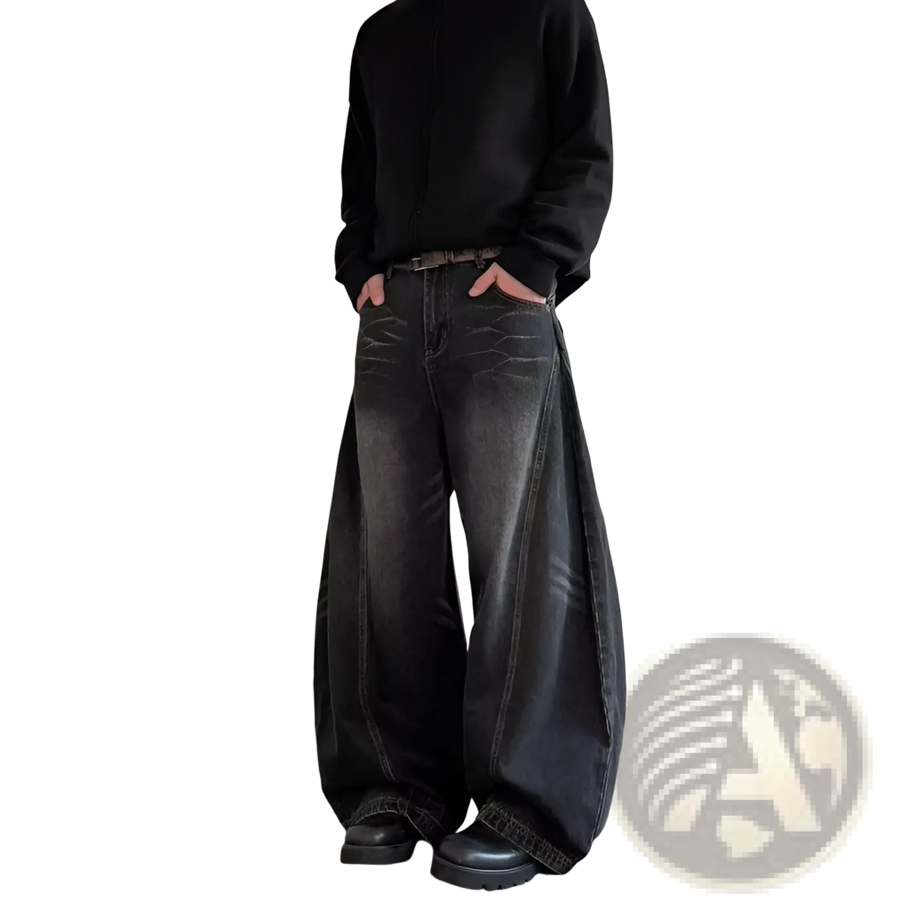 Men’s premium relaxed wide leg denim jeans in black with faded distressed look and visible stitching details