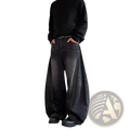Men’s premium relaxed wide leg denim jeans in black with faded distressed look and visible stitching details