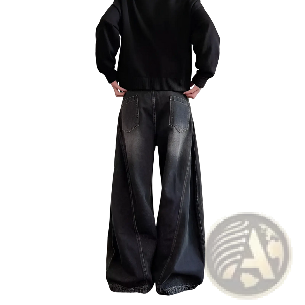 Men’s premium relaxed wide leg denim jeans in black with a faded distressed finish and visible stitching details