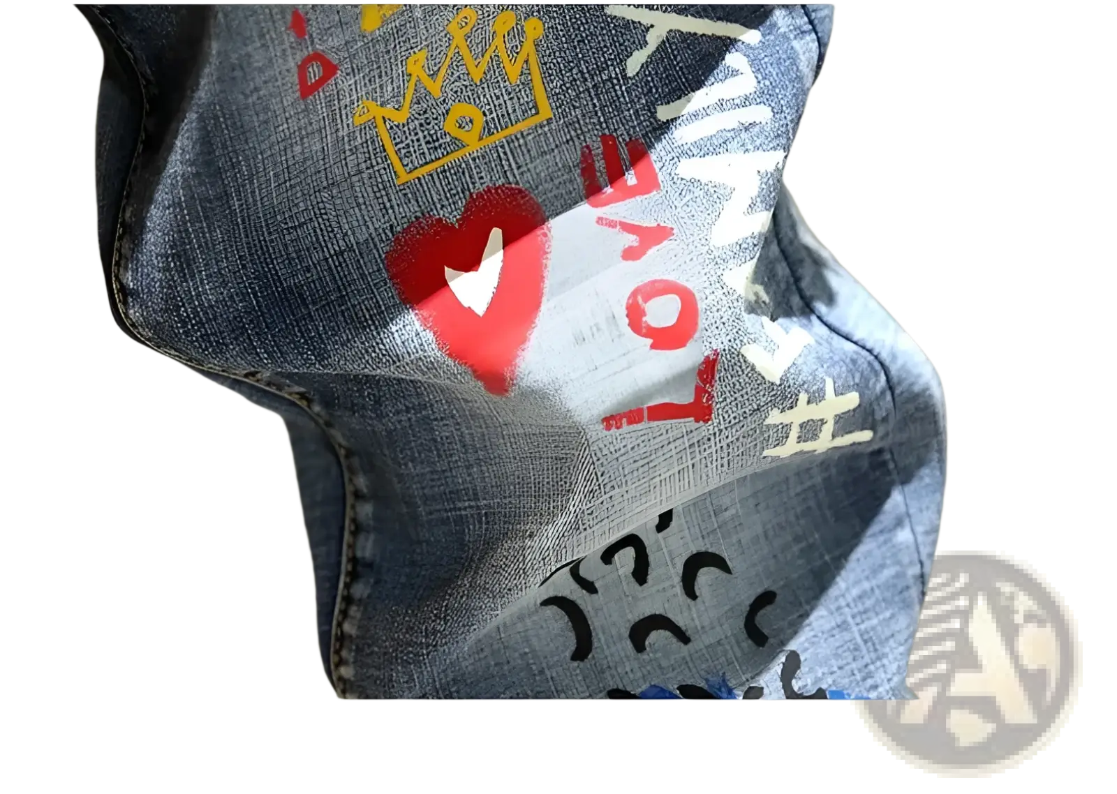 Men’s blue denim printed stretch slim jeans featuring colorful graffiti graphics with a red heart yellow crown and love lettering