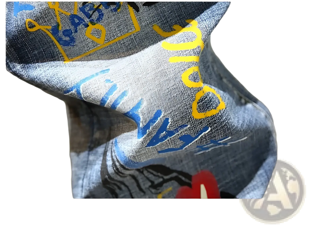 Men’s printed stretch slim jeans in denim fabric with blue and yellow graffiti style graphic on the back side