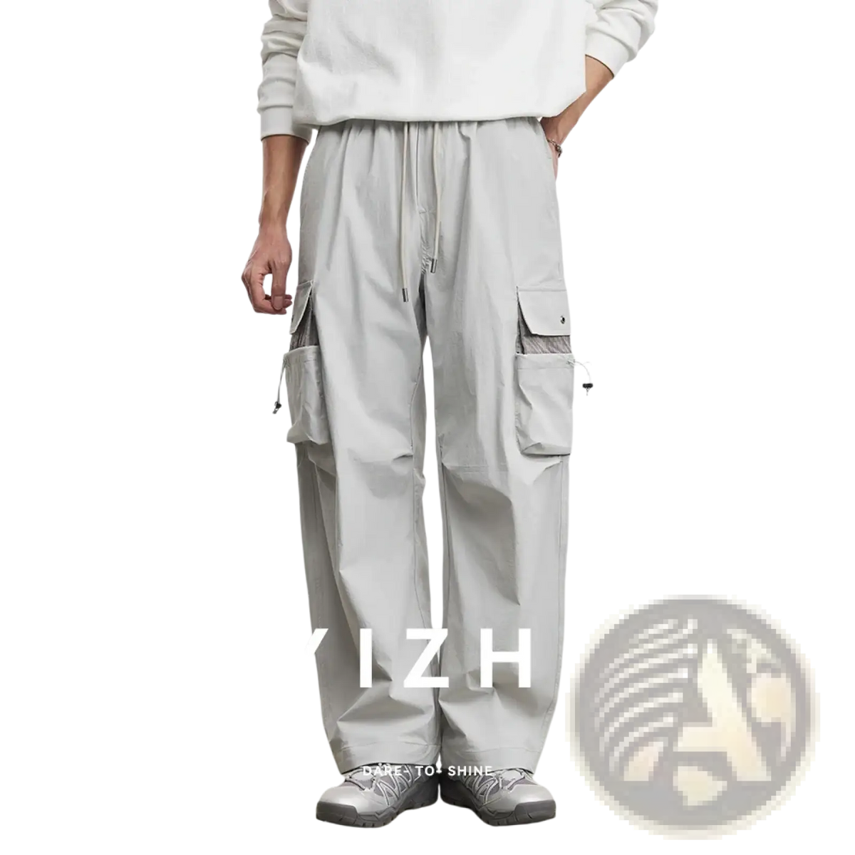 Men’s light gray quick dry cargo pants with multiple pockets and drawstring waistband for casual wear