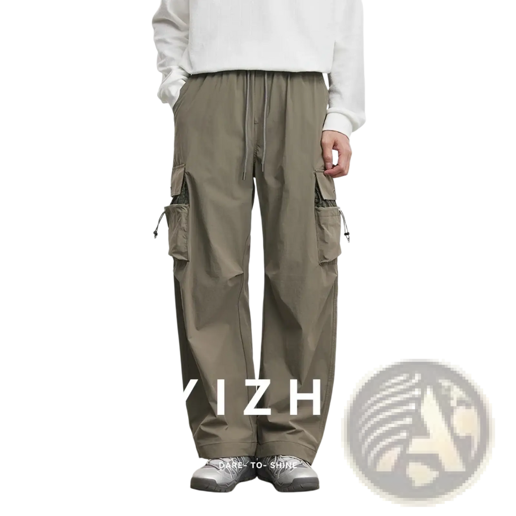 Olive green men’s quick dry cargo pants with multiple side pockets and drawstring waistband for casual wear