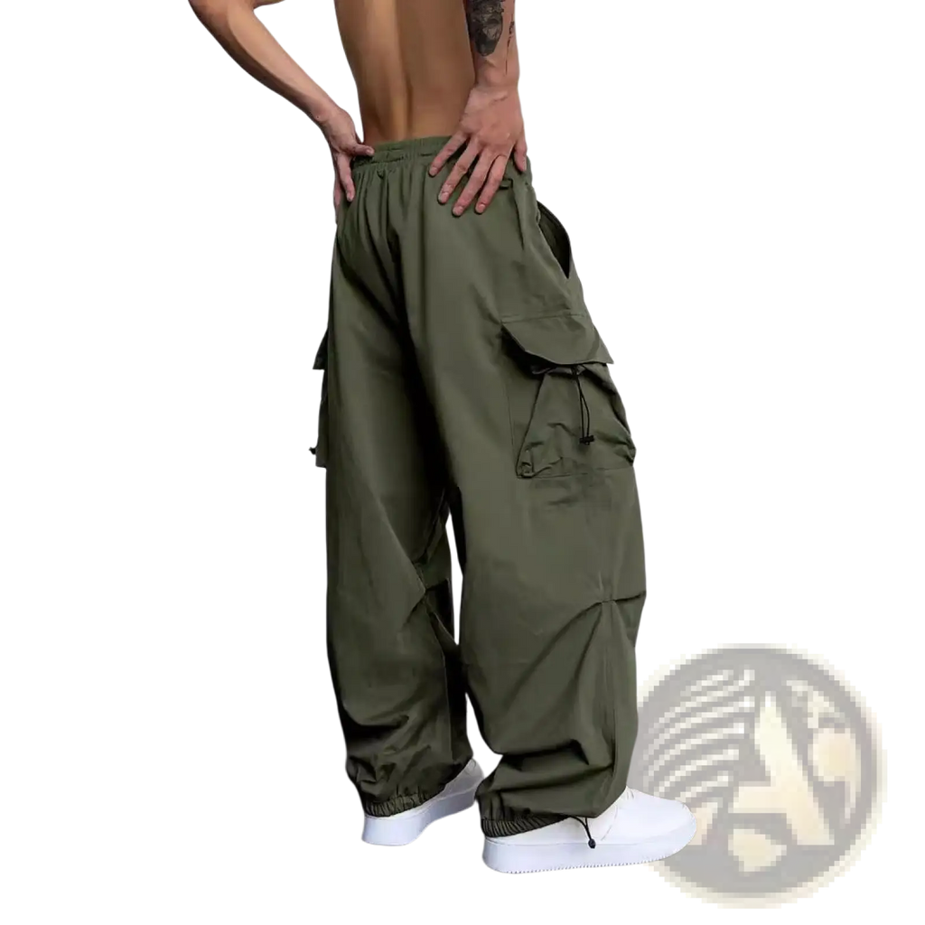 Men’s olive green quick dry cargo pants with wide leg, multiple pockets, and drawstring waistband front view