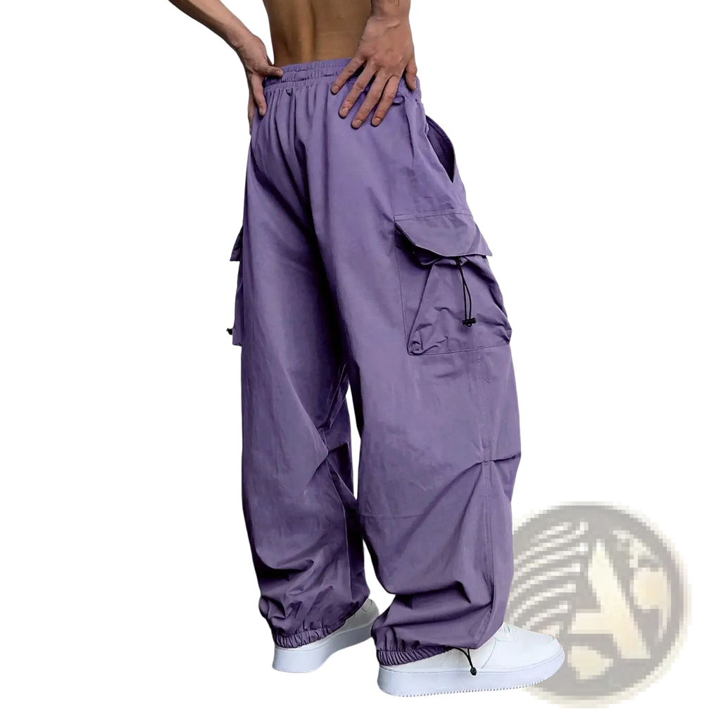 Men’s purple quick dry cargo pants with wide leg, multiple pockets, elastic waistband, and drawstring closure