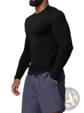 Men’s quick dry long sleeve athletic fishing shirt in black textured knit fabric with ribbed cuffs and form-fitting design
