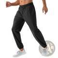 Men’s quick dry nylon loose fit athletic track pants in black with elastic waistband drawstring tapered legs and ribbed cuffs