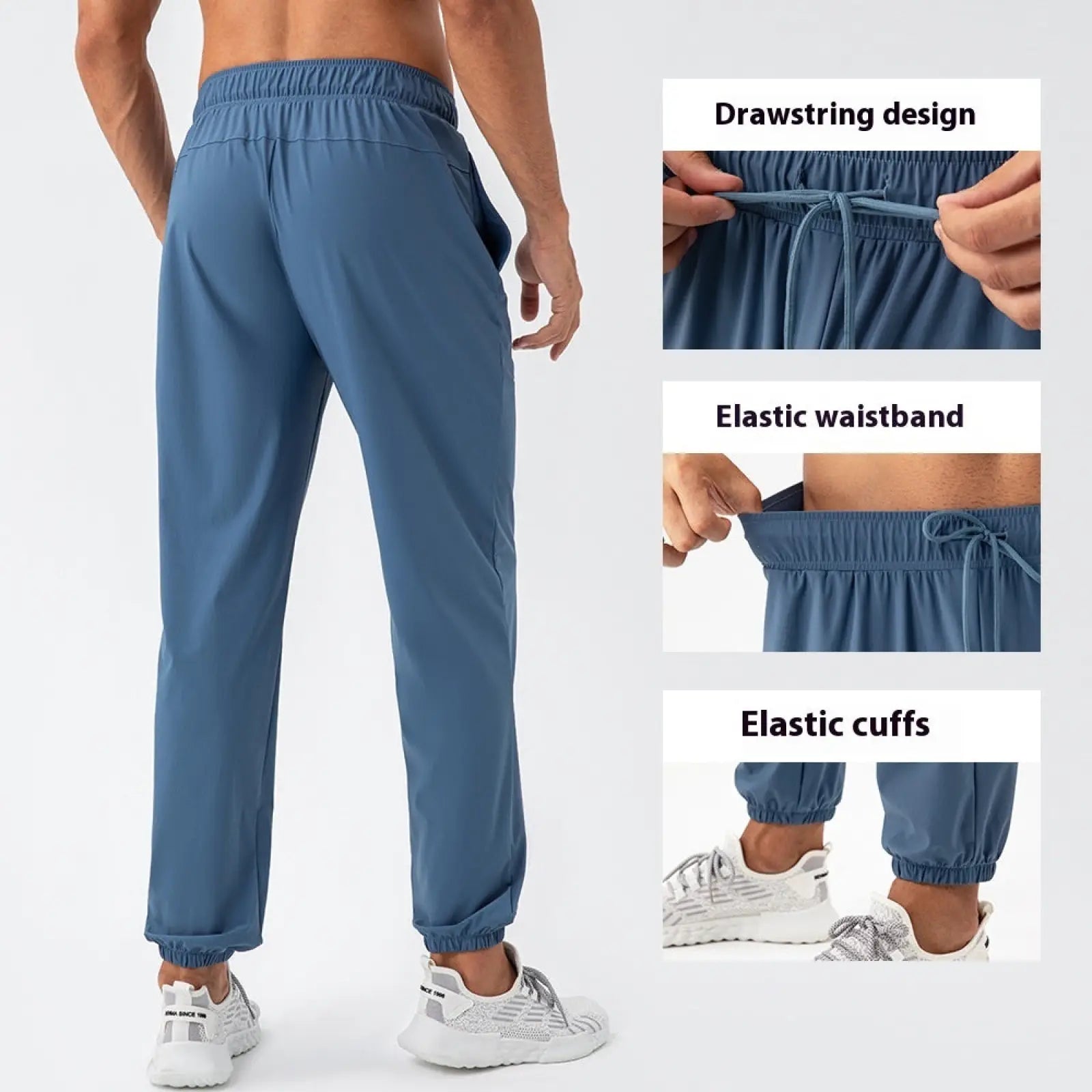 Men’s quick dry nylon loose fit athletic track pants in blue with elastic waistband, drawstring, and cuffed ankles