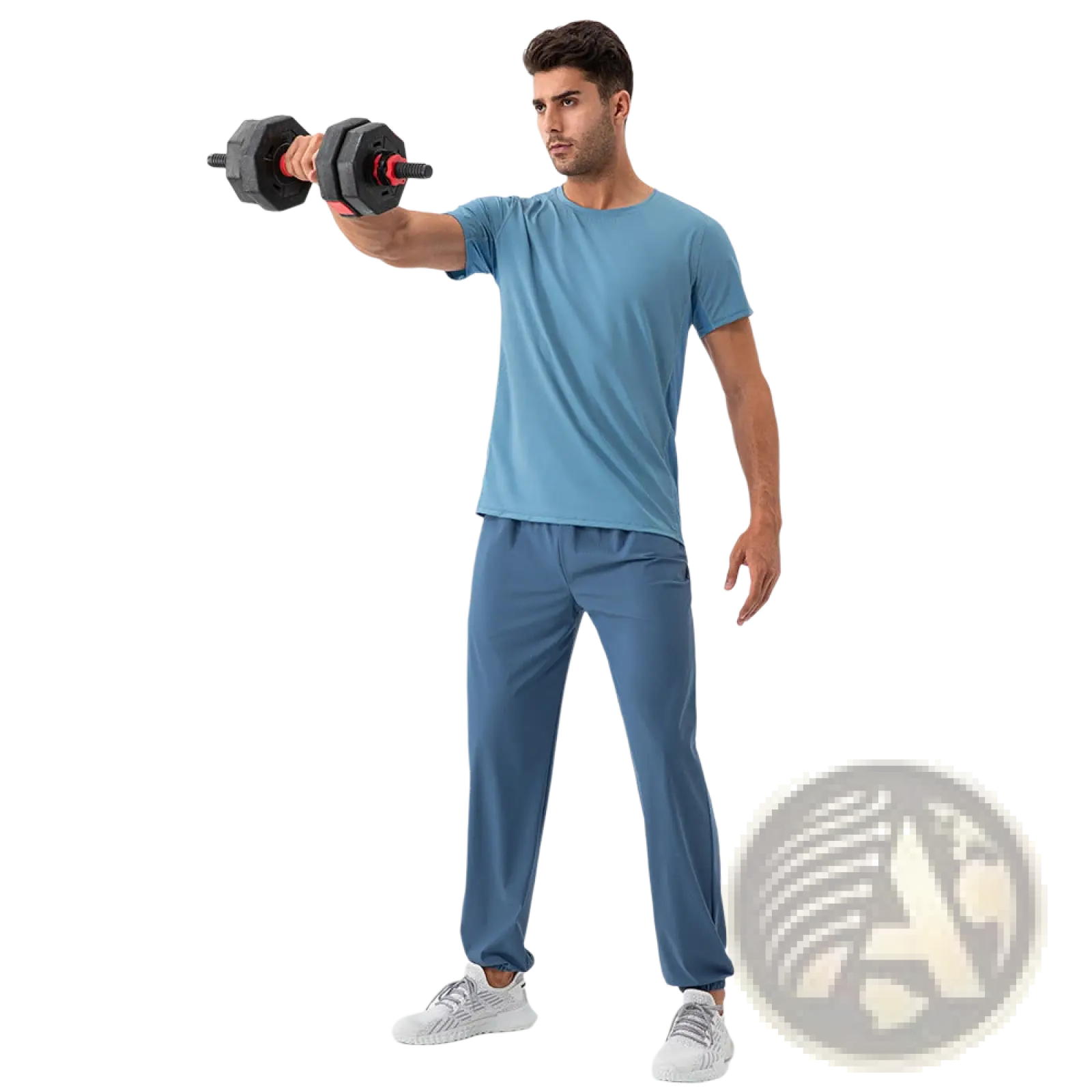 Man wearing blue quick dry nylon loose fit athletic track pants holding black and red hexagonal dumbbell
