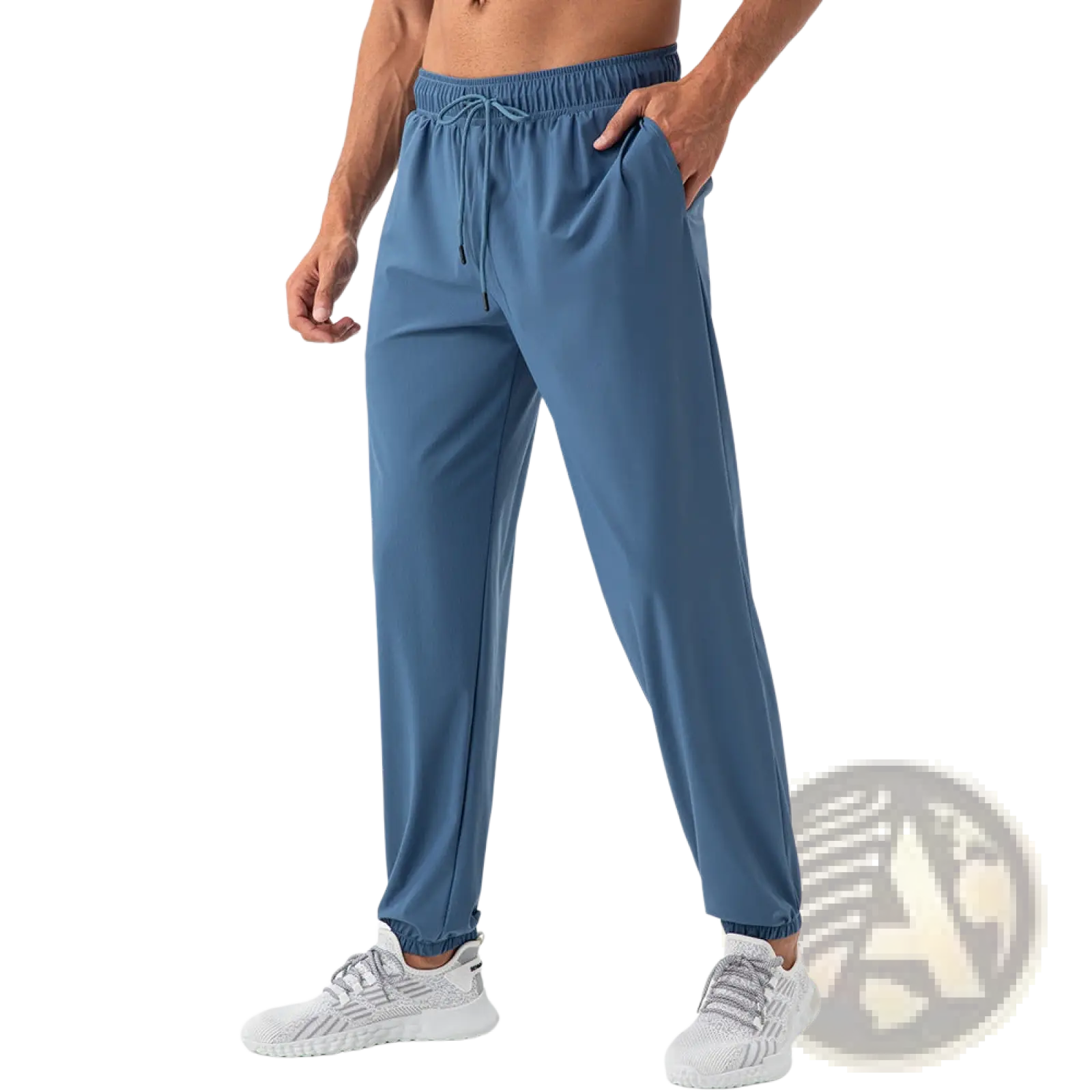 Men’s blue quick dry nylon loose fit athletic joggers with elastic waistband drawstring and smooth fabric finish