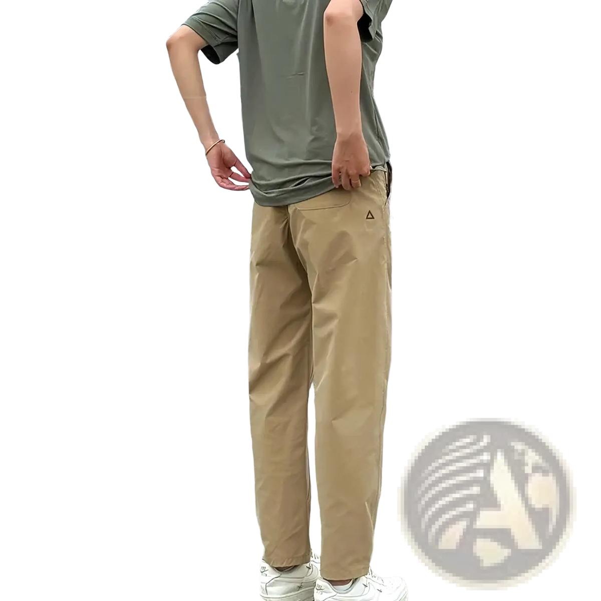 Beige quick dry tactical cargo pants for men showing back side with small black triangle logo on the pocket