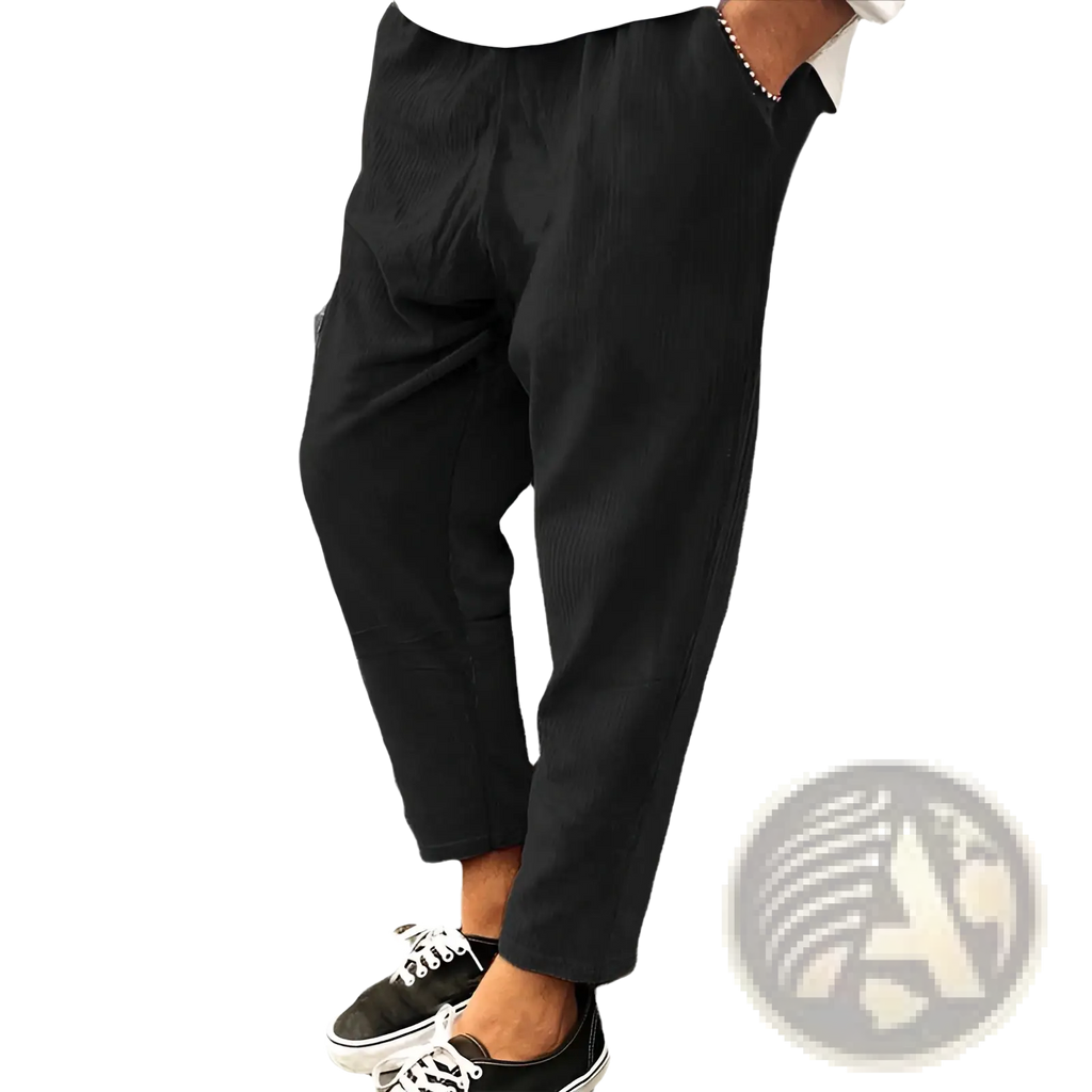 Men’s relaxed fit corduroy jogger trousers in black cotton with a loose fit and tapered leg design