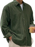 Men’s relaxed fit olive green corduroy shirt jacket with rolled cuffs and button-up front in a casual style