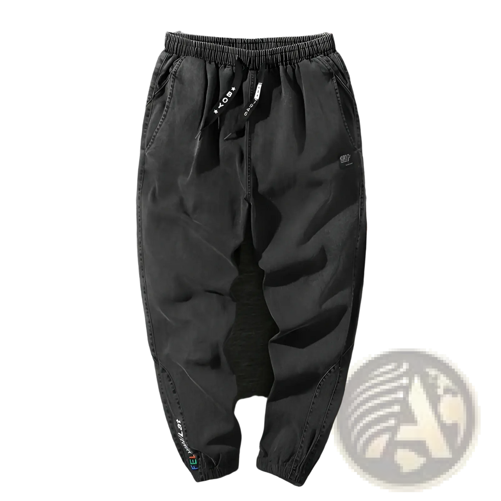 Men’s relaxed fit black denim joggers with elastic waistband, drawstring, and subtle side seam branding