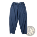 Men’s relaxed tapered dark blue denim jeans with patch detail featuring contrasting white stitching along the seams