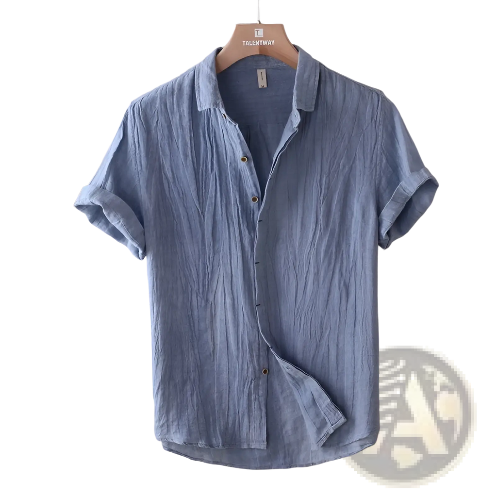 Men’s retro distressed linen short sleeve shirt in light blue textured cotton with button-up front and rolled cuffs