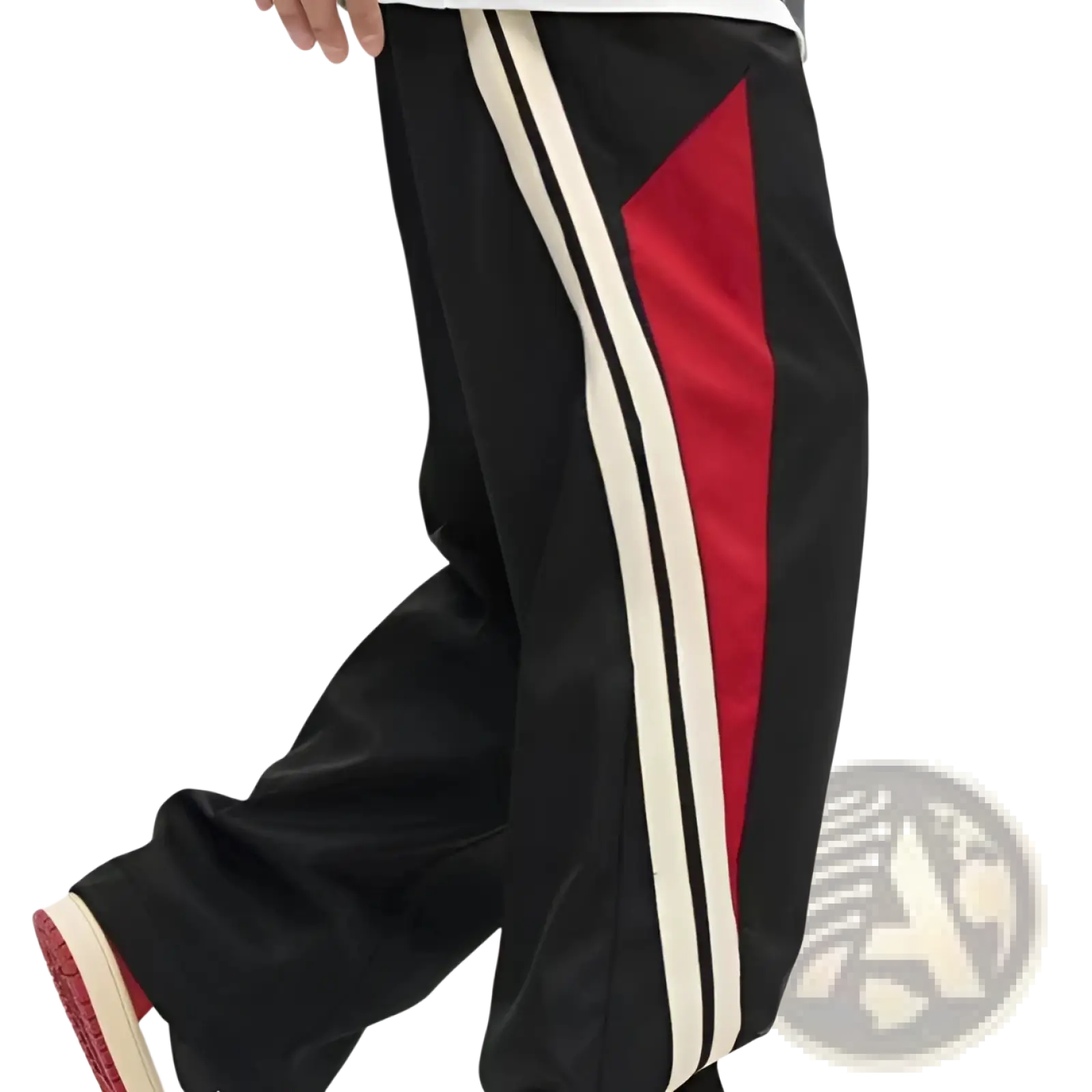 Men’s retro striped athletic track pants in black with bold red and cream vertical stripes along the side