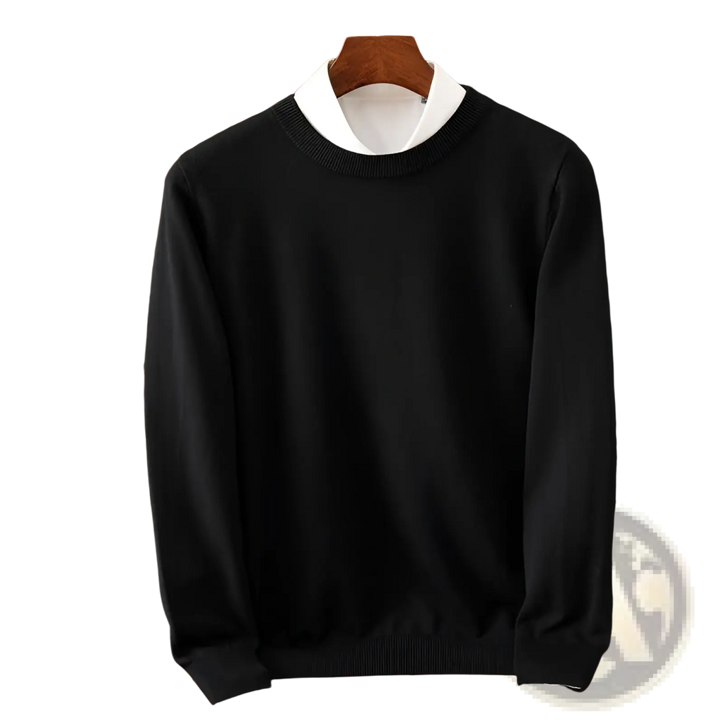 Men’s black ribbed crewneck pullover sweater with ribbed cuffs and hem displayed over white collared shirt on wooden hanger