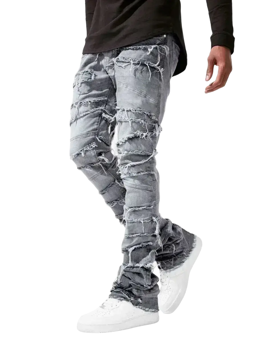 Men’s distressed gray denim jeans with multiple horizontal rips and frayed edges for streetwear style