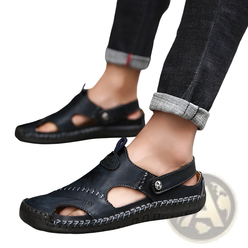 Men’s roman black leather sandals with stitched detailing and buckle strap featuring a rubber sole