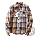Men’s sherpa lined plaid fleece flannel shirt jacket in cozy beige navy blue and gray long-sleeved flannel material