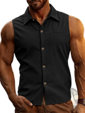 Mens sleeveless corduroy button up shirt in black with collar chest pocket and light-colored buttons