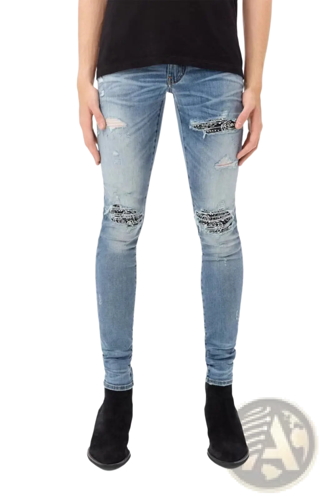 Men’s slim fit light-wash denim jeans with distressed ripped knees and black and white bandana-style patches