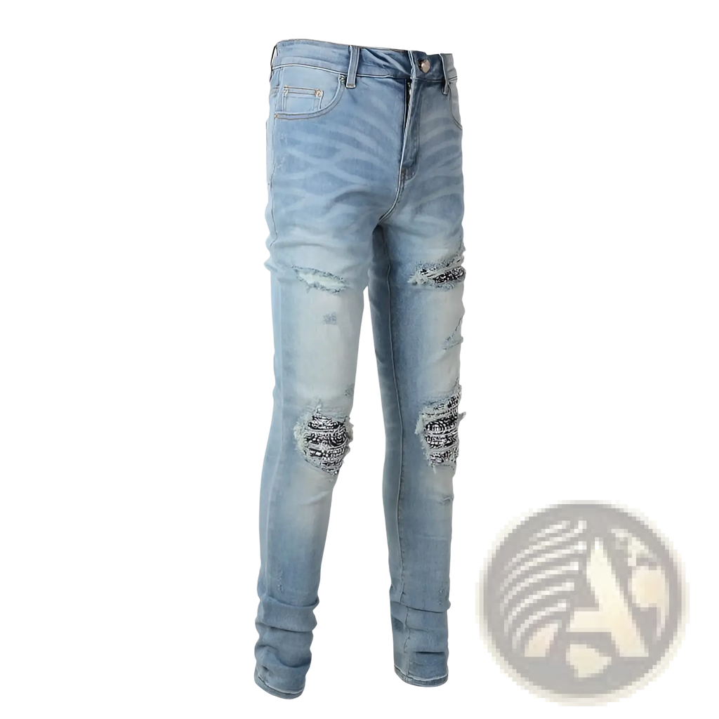 Men’s slim fit light wash denim jeans with distressed ripped knees and black bandana style embroidery patches
