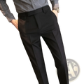 Men’s slim fit british style tailored black trousers with sleek modern cut and subtle pleats in straight leg design