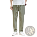 Men’s slim fit cotton linen tapered joggers in olive green with a white drawstring waistband