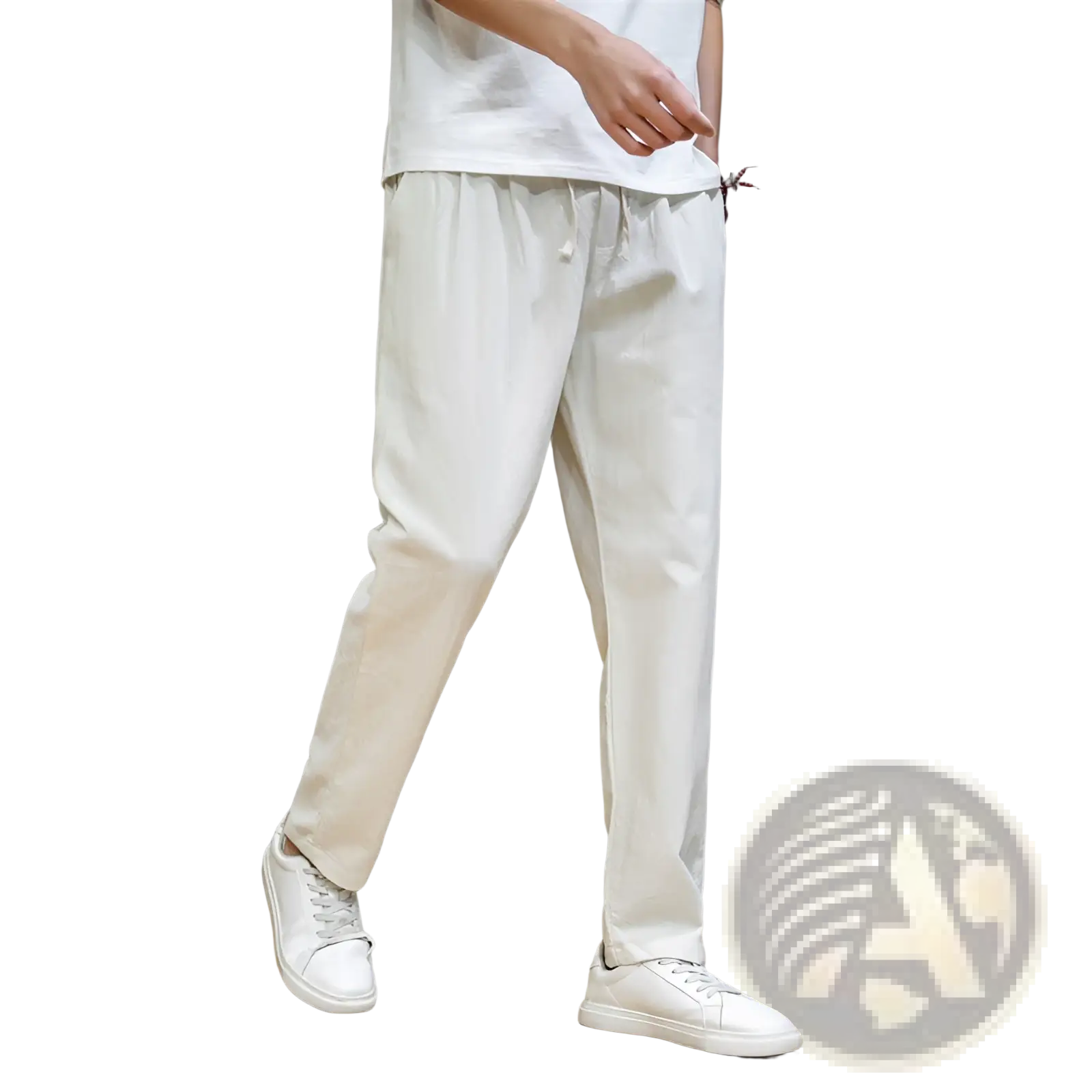 Men’s slim fit cotton linen tapered joggers in cream color with loose fit drawstring waist and subtle embroidery detail
