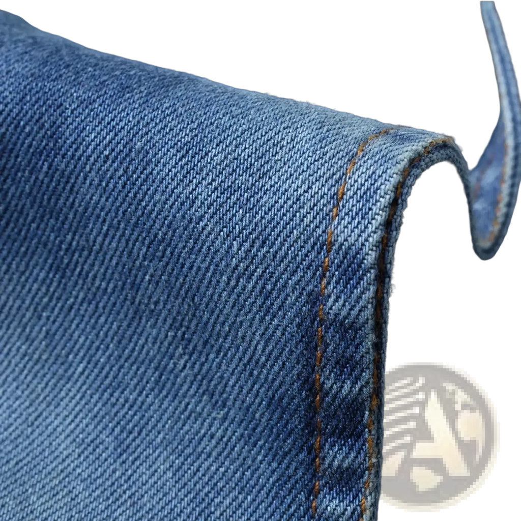 Men’s slim fit denim blazer jacket in medium-wash blue denim with diagonal twill weave and orange stitching along seam