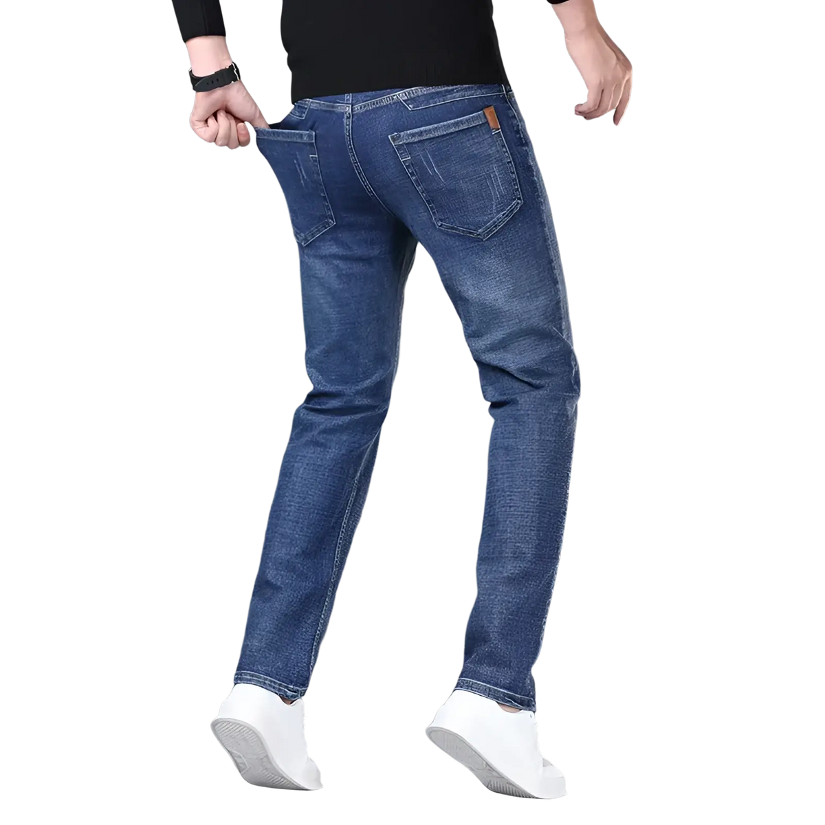 Men’s slim fit stretch denim jeans in blue with subtle fading, classic back pockets, and brown leather brand patch visible from back