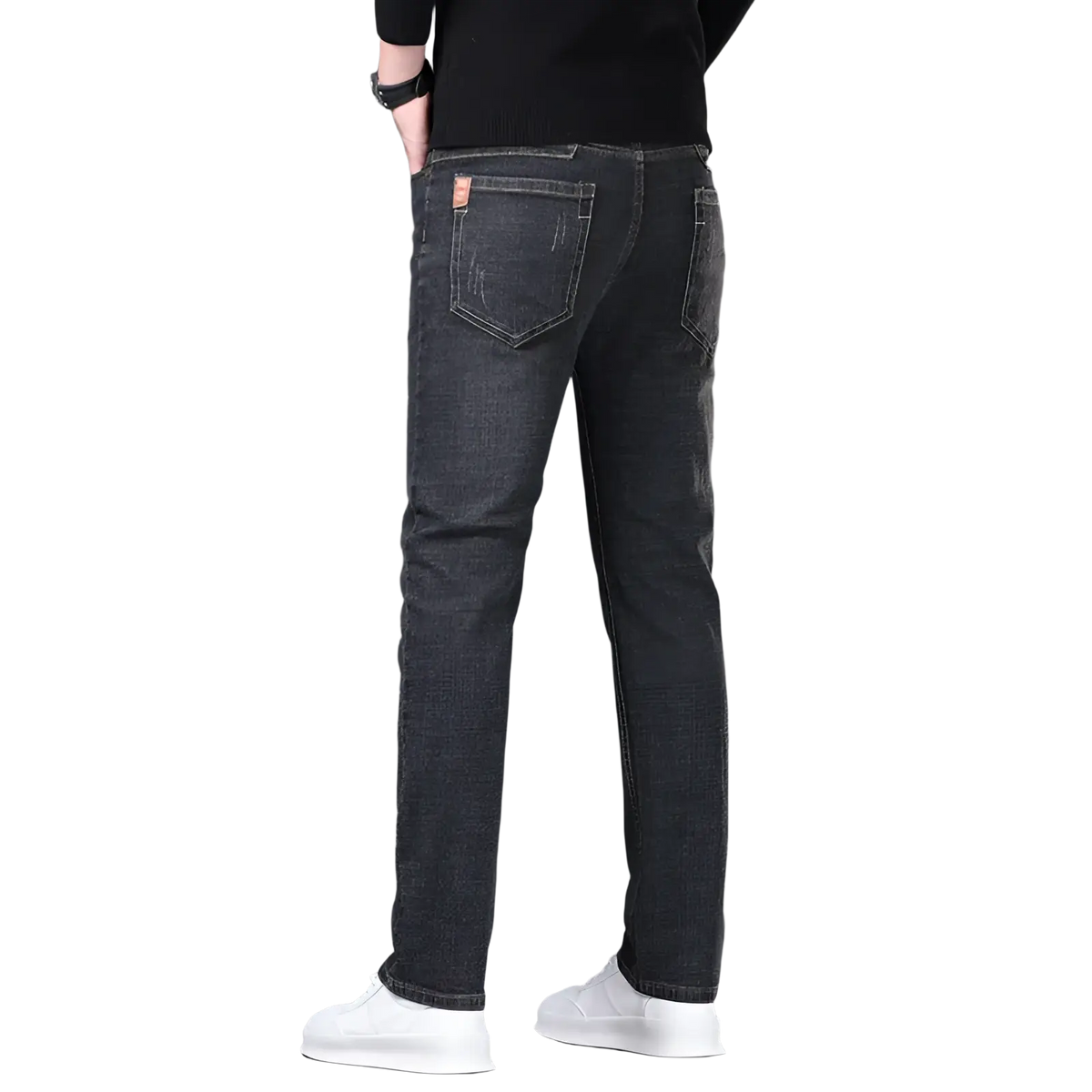 Men’s slim fit stretch denim jeans in dark gray with subtle fading and a small brown leather patch on the back pocket rear view