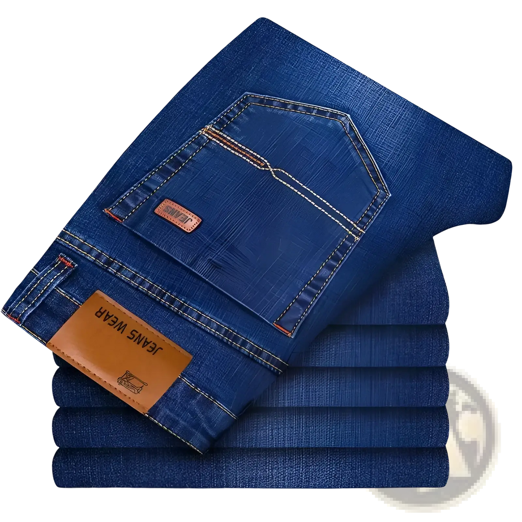 A stack of men’s slim fit stretch denim jeans in dark blue with brown leather brand tags and contrasting stitching