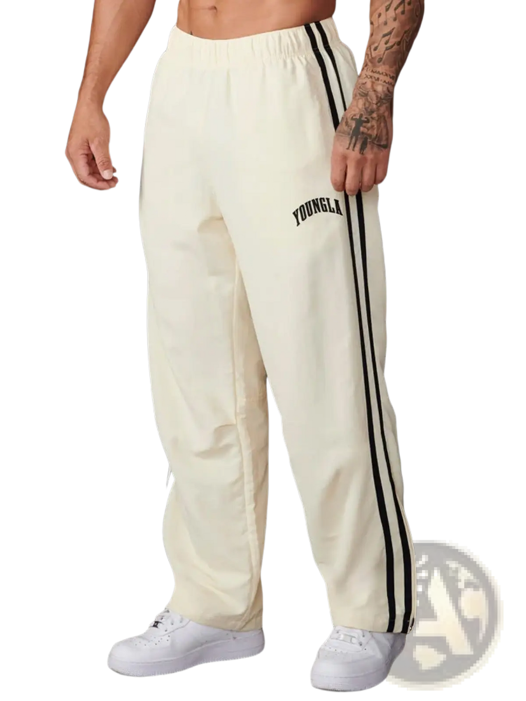 Men’s slim fit athletic track pants in cream color with black side stripes and Youngla logo on the left thigh