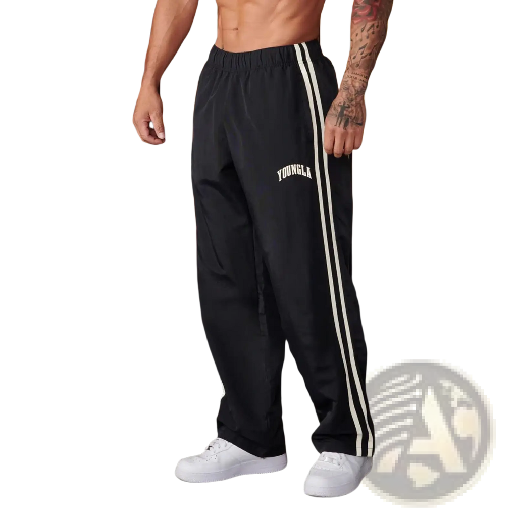 Men’s slim fit black athletic track pants with white side stripes and branded logo on the thigh