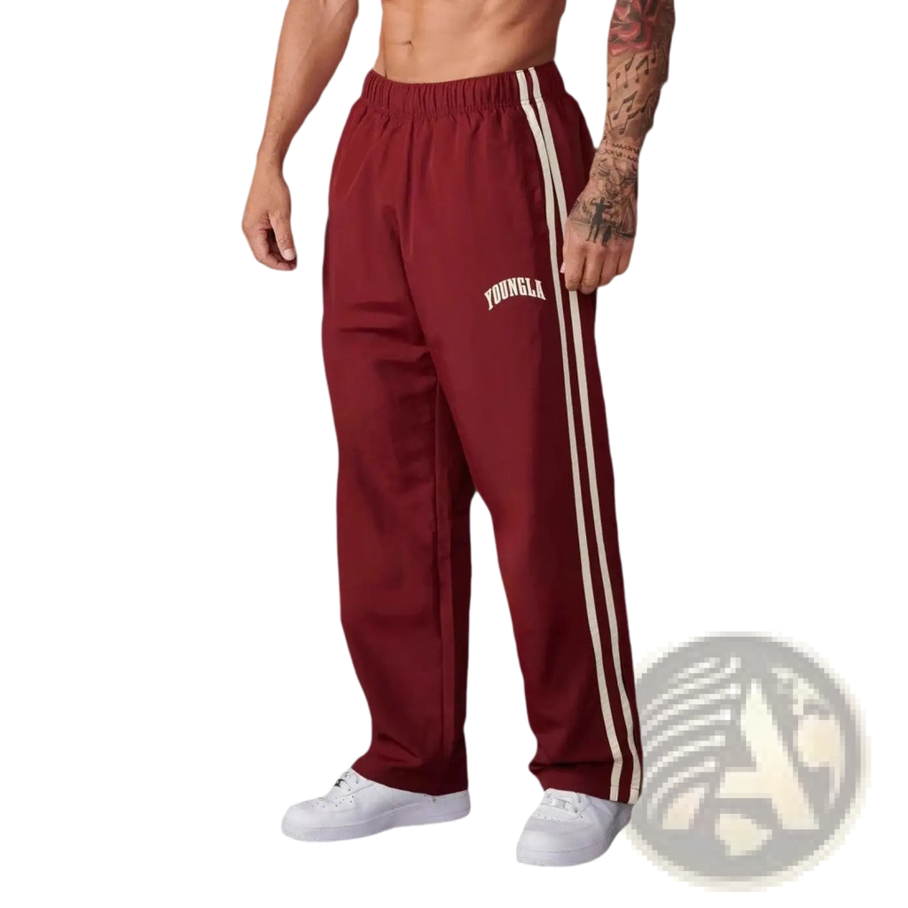 Men’s slim fit maroon athletic track pants with white side stripes and YoungLA logo embroidered on thigh