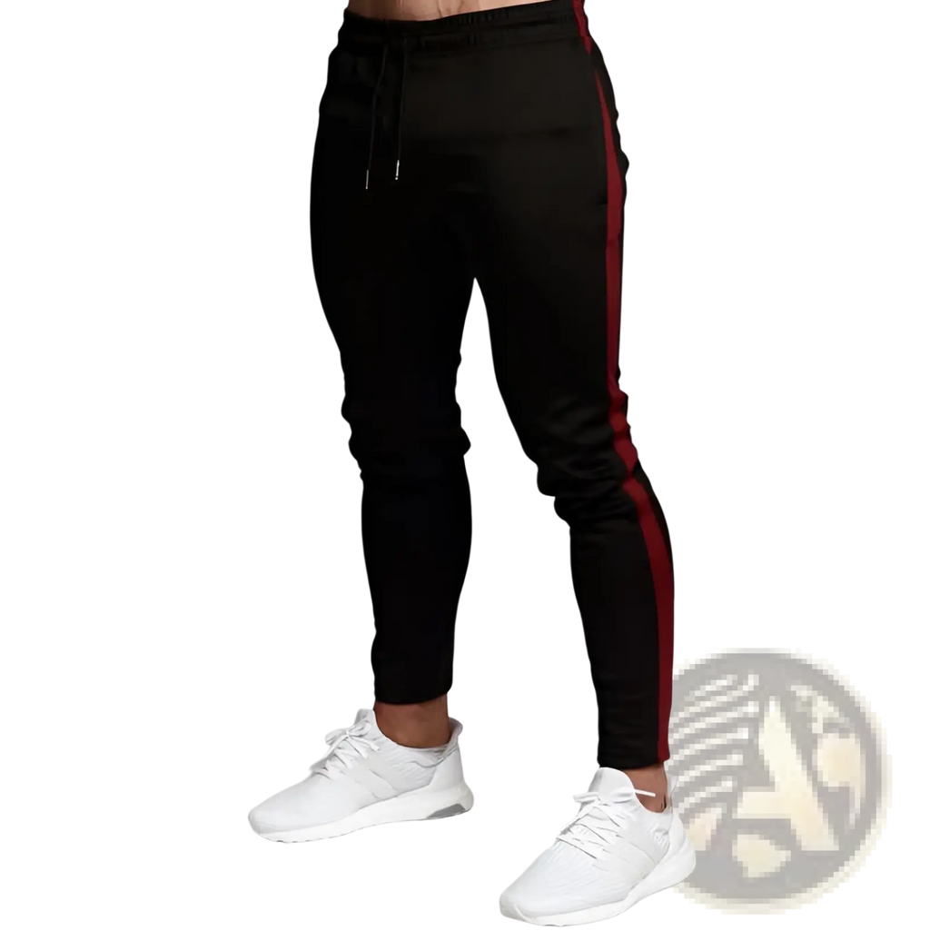 Men’s slim fit tapered athletic joggers in black with bold red side stripe and drawstring waistband for active wear
