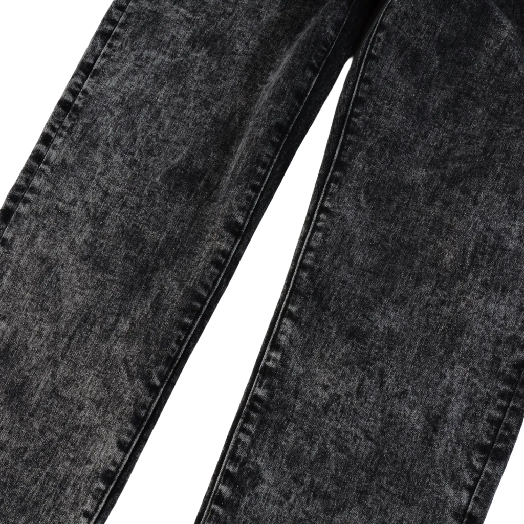 Men’s smoky gray slim fit distressed retro skinny jeans in black denim with faded texture and visible seam stitching
