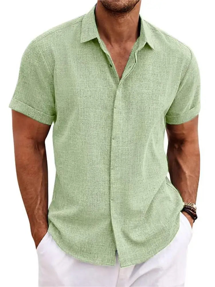 Men’s relaxed fit solid light green linen short sleeve shirt with subtle textured weave and button-up front